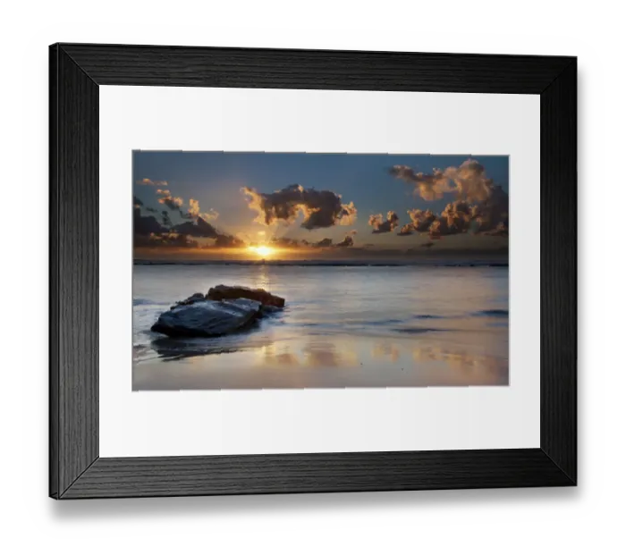Framed Print : Sunrise landscape of ocean with waves clouds and rocks on beach Framed Print : Sunrise landscape of ocean with waves clouds and rocks on beach