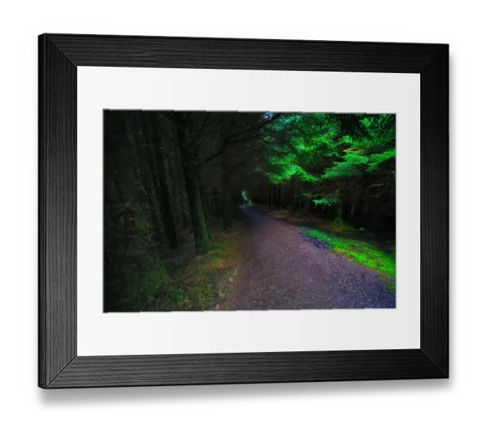 Framed Print : Lonesome Road Leading Through Dark and Eerie Forest on the Isle of Skye, Scotland Framed Print : Lonesome Road Leading Through Dark and Eerie Forest on the Isle of Skye, Scotland