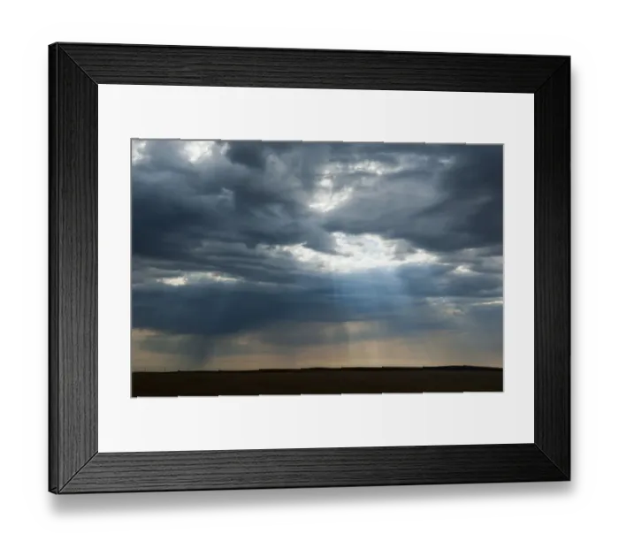 Framed Print : Sunlight breaking through dark clouds near Minuteman nuclear missile site, South Dakota, USA Framed Print : Sunlight breaking through dark clouds near Minuteman nuclear missile site, South Dakota, USA