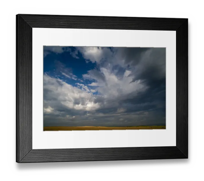 Framed Print : Summer morning massive cloud formations over wheat fields on South Dakota prairie, USA Framed Print : Summer morning massive cloud formations over wheat fields on South Dakota prairie, USA