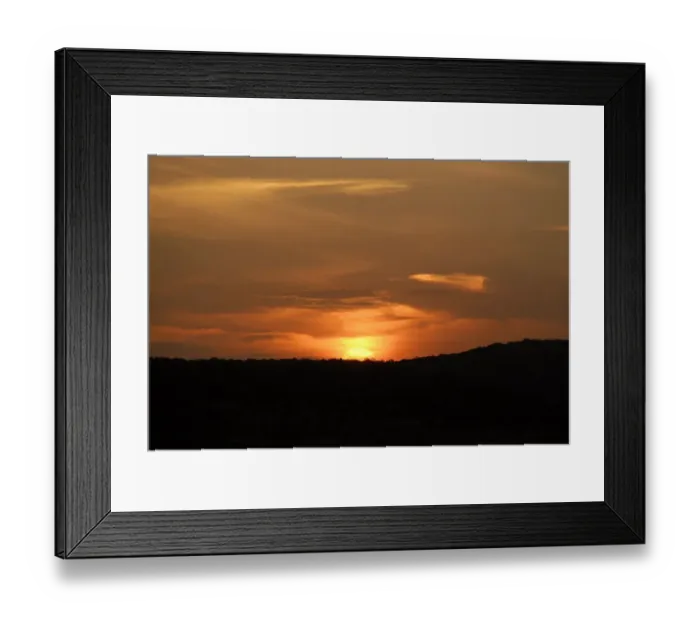 Framed Print : Orange sunset as sun sets behind hill, Phinda Private Game Reserve, KwaZulu-Natal, South Africa Framed Print : Orange sunset as sun sets behind hill, Phinda Private Game Reserve, KwaZulu-Natal, South Africa