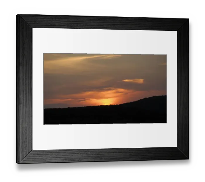 Framed Print : Golden sunset falling behind silhouetted hills in the Phinda Private Game Reserve, KwaZulu-Natal, South Africa Framed Print : Golden sunset falling behind silhouetted hills in the Phinda Private Game Reserve, KwaZulu-Natal, South Africa