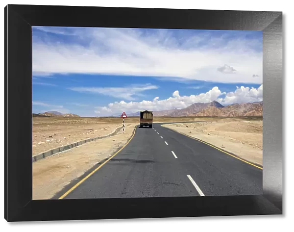 asia, clouds, color image, colour, day, desert road, driving, horizon over land, horizontal