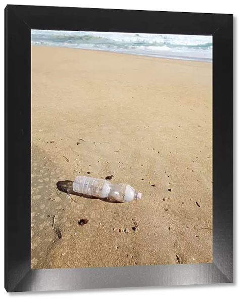 beach, bottle, clear sky, color image, colour image, container, day, daytime, decanter