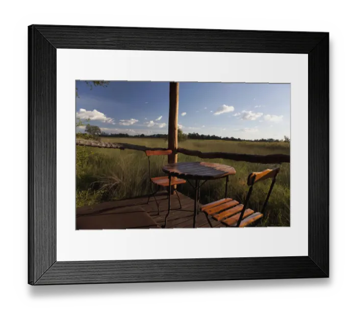 Framed Print : absence, botswana, chair, color image, day, deck, empty, grass, horizontal, landscape Framed Print : absence, botswana, chair, color image, day, deck, empty, grass, horizontal, landscape