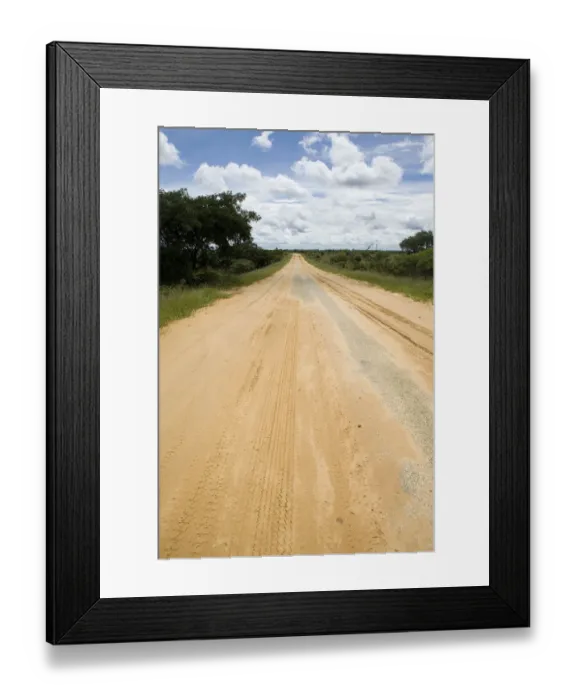 Framed Print : beauty in nature, cloud, day, diminishing perspective, dirt road, dry, idyllic, inhambane province Framed Print : beauty in nature, cloud, day, diminishing perspective, dirt road, dry, idyllic, inhambane province