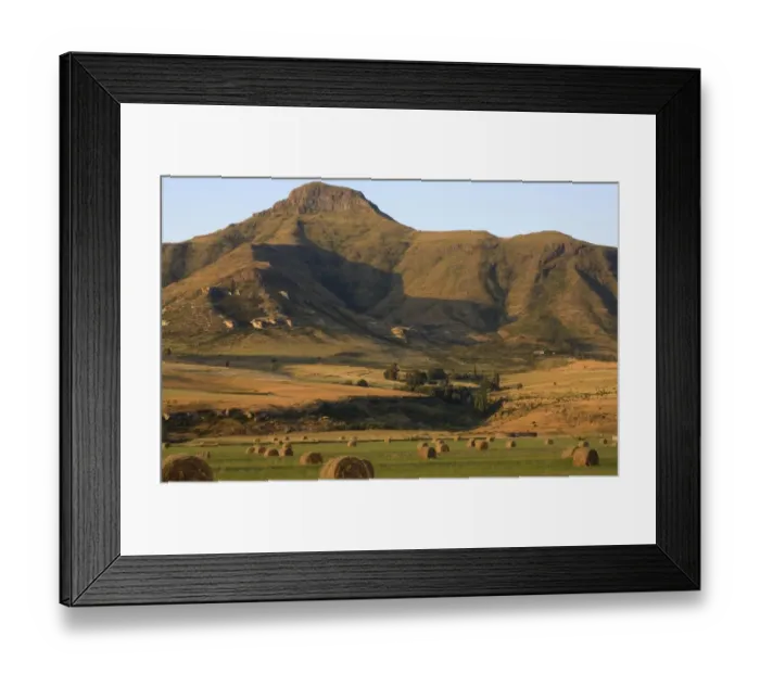 Framed Print : Round Hay Bales in Field with Maluti Mountain Range Behind. Clarens, Freestate Province, South Africa Framed Print : Round Hay Bales in Field with Maluti Mountain Range Behind. Clarens, Freestate Province, South Africa
