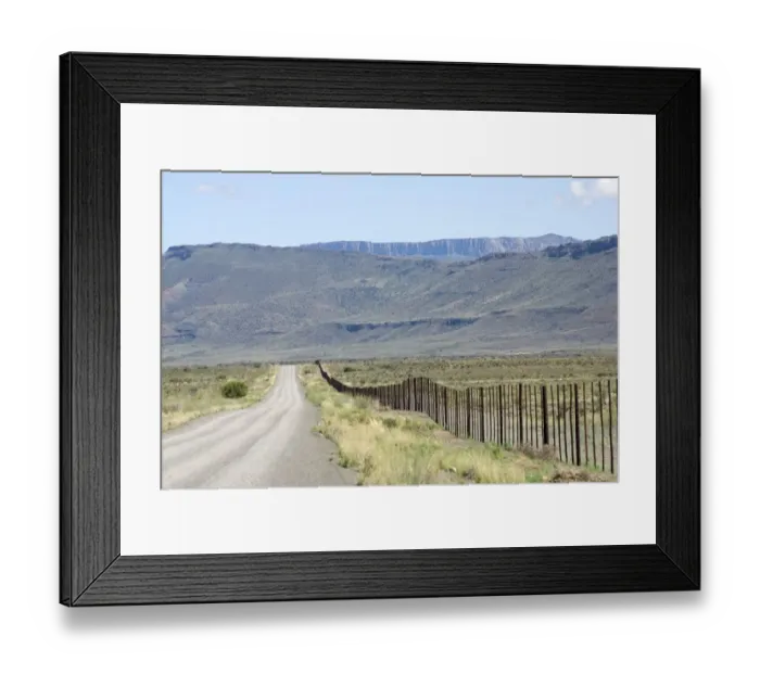 Framed Print : Dirt Road Through a Desert Landscape Framed Print : Dirt Road Through a Desert Landscape