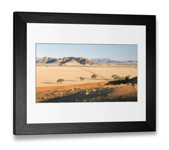 Framed Print : View Of Arid Sandy Landscape with Mountains in Background