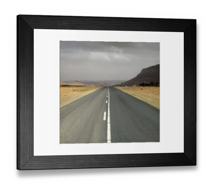 Framed Print : Dual Tar Road Going Through Arid Area on an Overcast Day Framed Print : Dual Tar Road Going Through Arid Area on an Overcast Day