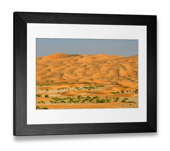 Framed Print : A Dry River Bed (Wadi) Through a Dune Field in the Desert Framed Print : A Dry River Bed (Wadi) Through a Dune Field in the Desert
