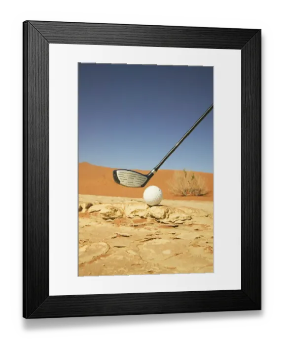 Framed Print : Golf Club and Ball on a Barren Desert Floor Framed Print : Golf Club and Ball on a Barren Desert Floor