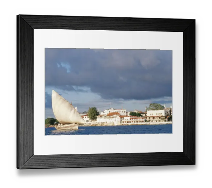 Framed Print : Dhow and Coastal Buildings Behind Framed Print : Dhow and Coastal Buildings Behind