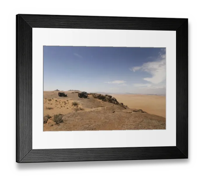 Framed Print : 4X4 Vehicles Overlooking a Vast Desert Landscape Framed Print : 4X4 Vehicles Overlooking a Vast Desert Landscape