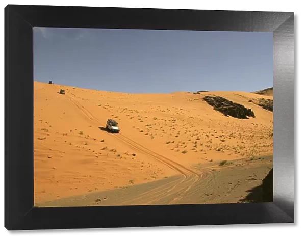 4X4 Vehicles Driving in a Desert Landscape