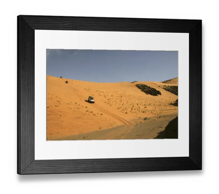 Framed Print : 4X4 Vehicles Driving in a Desert Landscape Framed Print : 4X4 Vehicles Driving in a Desert Landscape