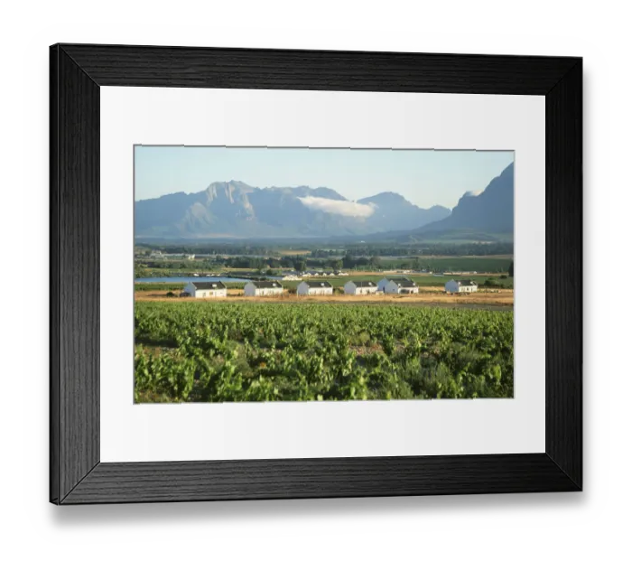 Framed Print : Farm Workers Cottages with Mountains in the Background