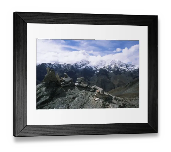 Framed Print : Stone Cairn with Snow-Capped Mountains in the Background Framed Print : Stone Cairn with Snow-Capped Mountains in the Background