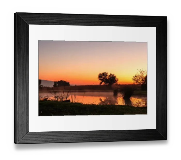 Framed Print : The sun rises over a small dam in the high veld winter landscape near Hartebeespoort, South Africa