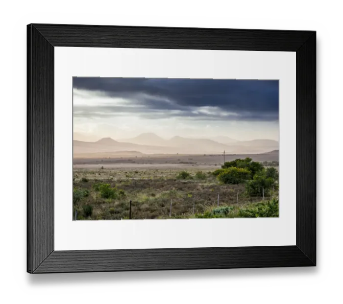 Framed Print : A typical Karoo landscape. The Karoo is a dry and arid area, with lots of history Framed Print : A typical Karoo landscape. The Karoo is a dry and arid area, with lots of history