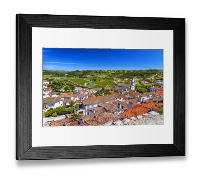 Framed Print : Medieval town with fortified walls and Santa Maria church, Obidos, Portugal Framed Print : Medieval town with fortified walls and Santa Maria church, Obidos, Portugal