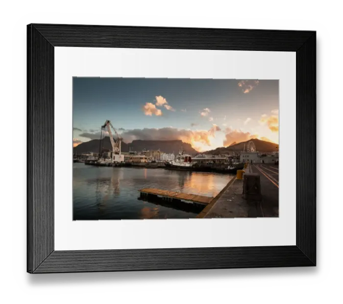 Framed Print : The Cape Town Waterfront, officially named the Victoria and Albert Waterfront, is Cape Towns most visited tourist attraction and a hub of local activity. It is located in the historic centre of a wor Framed Print : The Cape Town Waterfront, officially named the Victoria and Albert Waterfront, is Cape Towns most visited tourist attraction and a hub of local activity. It is located in the historic centre of a wor