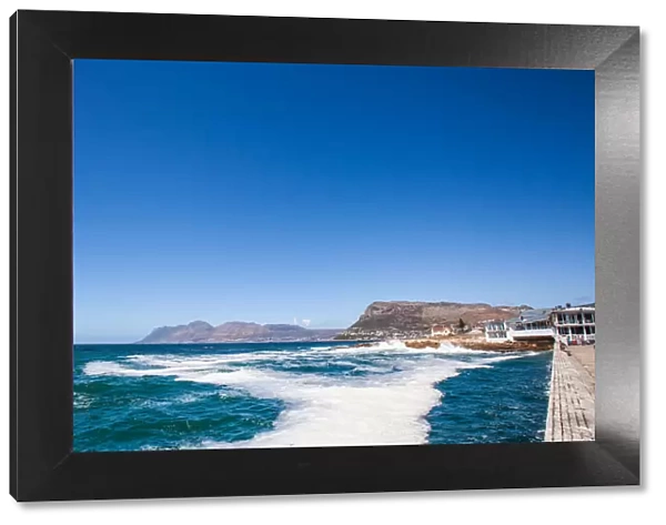 Kalk Bay is a fishing village on the coast of False Bay, South Africa and is now a suburb of greater Cape Town. It lies between the ocean and sharply rising mountainous heights that are buttressed by