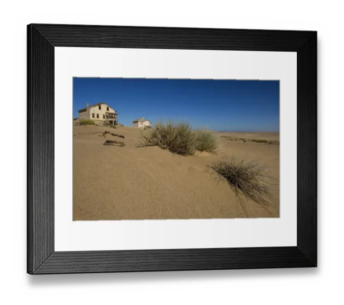 Framed Print : Landscape of the Abandoned Houses of the Mining Ghost Town of Kolmanskop, Luderitz, Namibia Framed Print : Landscape of the Abandoned Houses of the Mining Ghost Town of Kolmanskop, Luderitz, Namibia