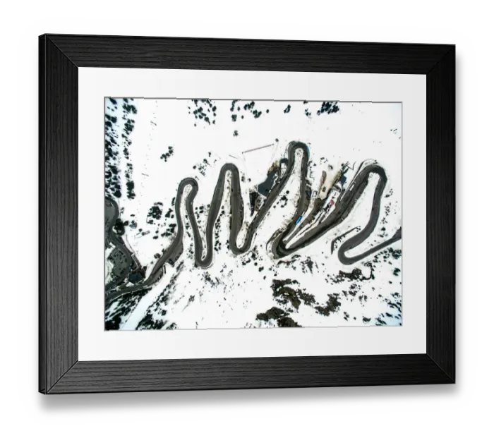 Framed Print : Stunning mountain road with nice curves between the snowy landscape and cars driving through it in the Andorra Pyrenees mountains with nice landscape Framed Print : Stunning mountain road with nice curves between the snowy landscape and cars driving through it in the Andorra Pyrenees mountains with nice landscape