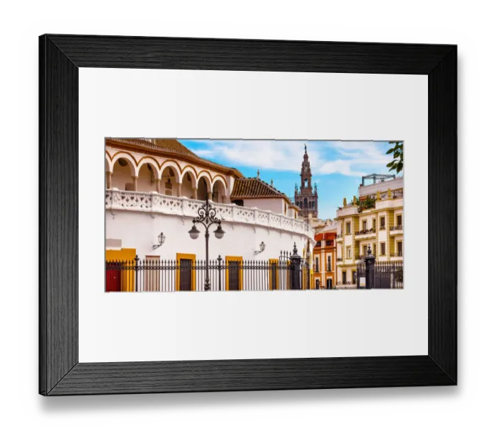 Framed Print : Bullring Stadium and Giralda Spire Bell Tower of Seville Cathedral, Seville, Andalusia, Spain Framed Print : Bullring Stadium and Giralda Spire Bell Tower of Seville Cathedral, Seville, Andalusia, Spain