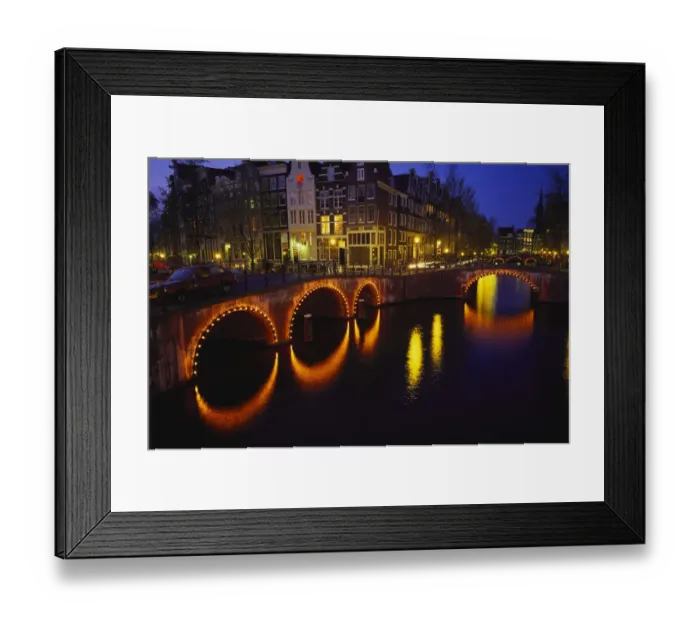 Framed Print : Illuminated Bridges Reflected in the Canals at Night, Keizersgracht, Amsterdam Framed Print : Illuminated Bridges Reflected in the Canals at Night, Keizersgracht, Amsterdam