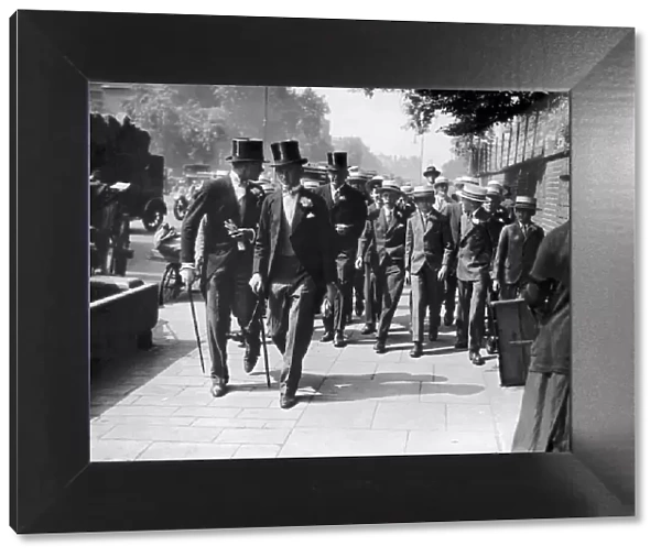 Eton Boys. 13th July 1928: A group of Eton and Harrow schoolboys arriving