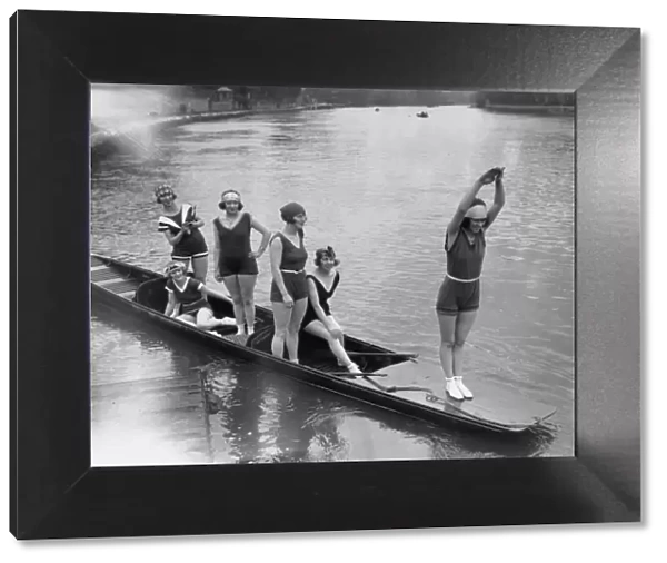 After You. 9th April 1925: A punt full of bathers waiting their turn to
