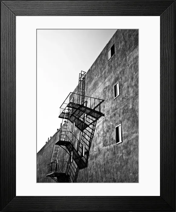 Framed Print : Fire escapes on an apartment building Framed Print : Fire escapes on an apartment building