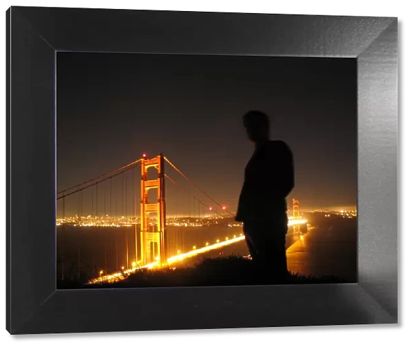 Silhouetted man with Golden Gate Bridge
