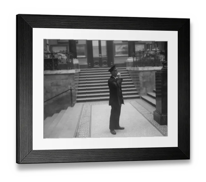 Framed Print : All Out. December 1927: A museum guard in the National Gallery blows his whistle Framed Print : All Out. December 1927: A museum guard in the National Gallery blows his whistle