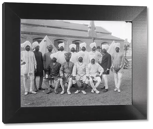 Sikh Men. circa 1900: A group of Sikh men wearing their national dress