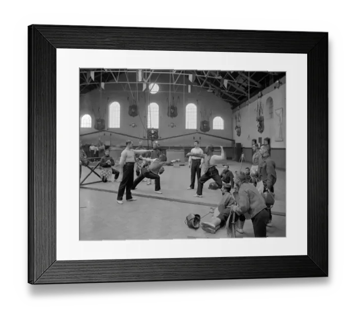 Framed Print : Fencers. circa 1905: A group of men in an Aldershot gymnasium watch a fencing contest Framed Print : Fencers. circa 1905: A group of men in an Aldershot gymnasium watch a fencing contest