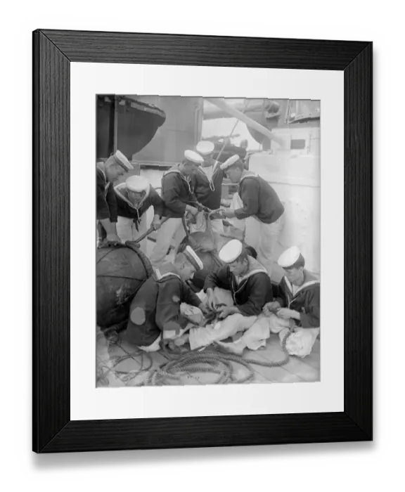 Framed Print : Teamwork. circa 1897: Sailors knotting and splicing rope on board the HMS Repulse Framed Print : Teamwork. circa 1897: Sailors knotting and splicing rope on board the HMS Repulse