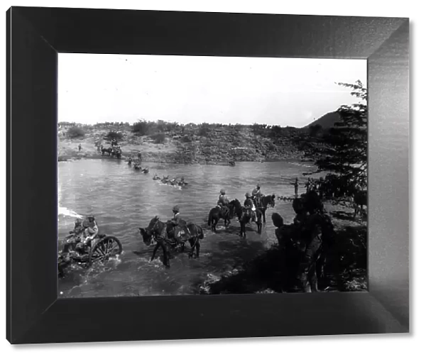 Boer War. circa 1900: British infantry crowning the Modder River with the