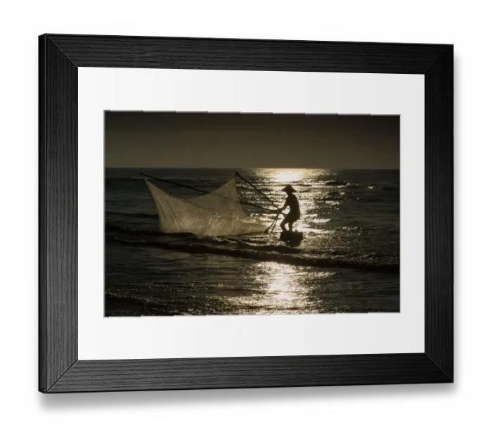 Framed Print : Fisherman with v-shape net in beach Framed Print : Fisherman with v-shape net in beach