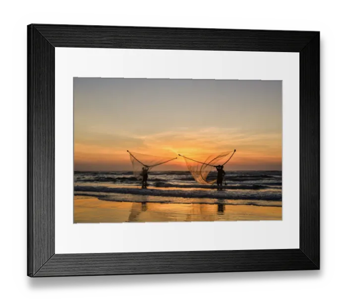 Framed Print : Two Fishermen fishing on the beach at dawn in Vietnam Framed Print : Two Fishermen fishing on the beach at dawn in Vietnam