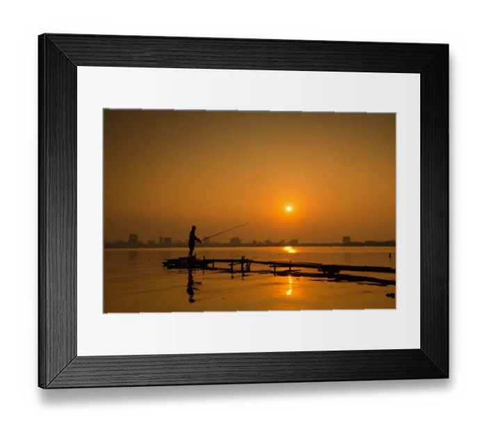 Framed Print : Fisherman fishing on Hanoi West Lake on sunset, Vietnam