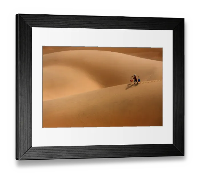 Framed Print : Burden Woman in Sand dune