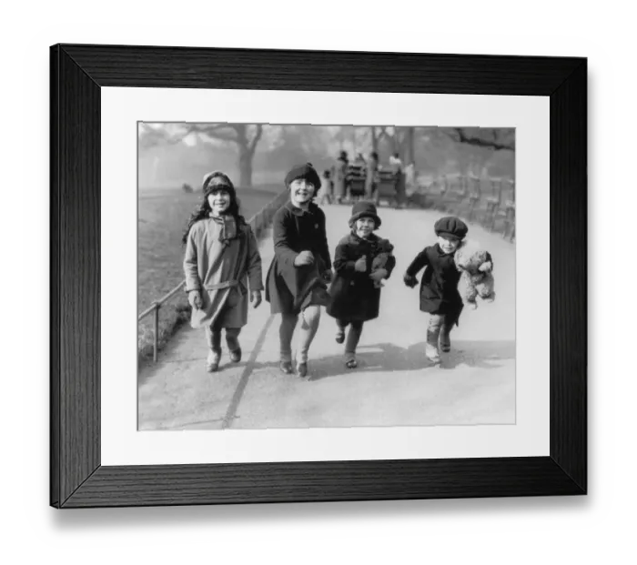 Framed Print : Park Life. Four children running through a park in England, circa 1930 Framed Print : Park Life. Four children running through a park in England, circa 1930