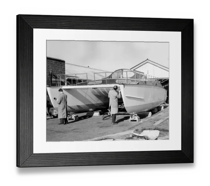 Framed Print : Painting A Catamaran Framed Print : Painting A Catamaran