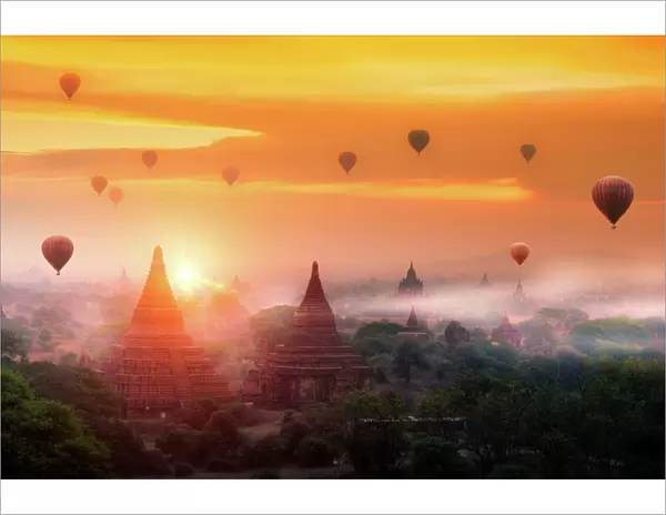 Hot air balloon over plain of Bagan in misty morning, Mandalay, Myanmar