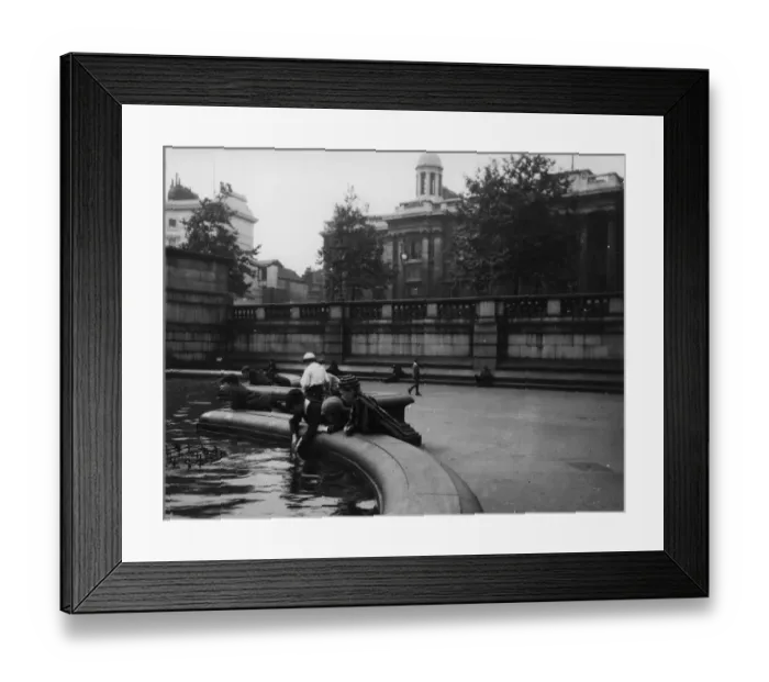 Framed Print : Boys. circa 1900: Schoolboys playing in Trafalgar Square, around 1900