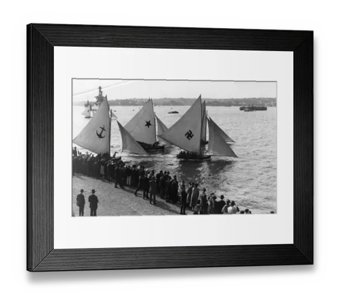 Framed Print : Sailboats. circa 1910: A crowd gathers to watch yachts in the harbour Framed Print : Sailboats. circa 1910: A crowd gathers to watch yachts in the harbour