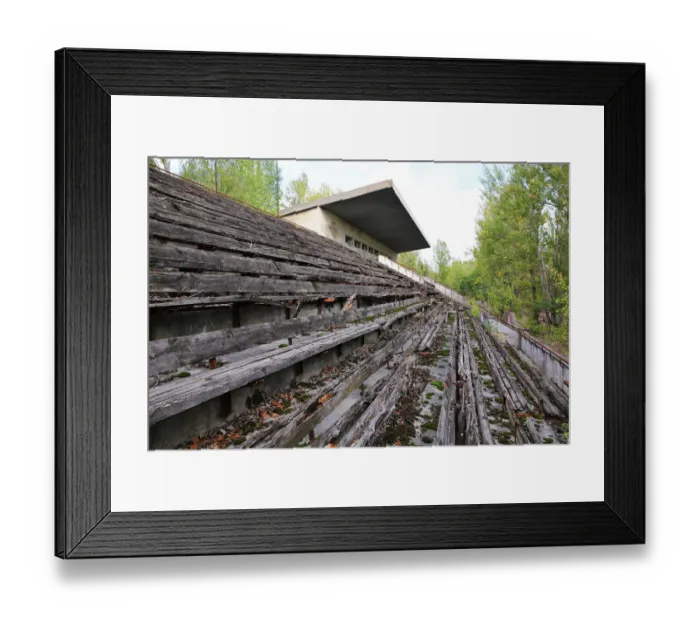 Framed Print : Empty stands of abandoned stadium in Pripyat city near Chernobyl Framed Print : Empty stands of abandoned stadium in Pripyat city near Chernobyl